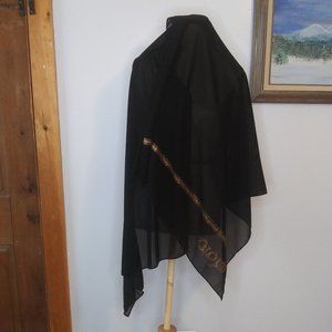 Black sheer scarf with gold rhinestone embellishment on one edge Made in Kuwait
